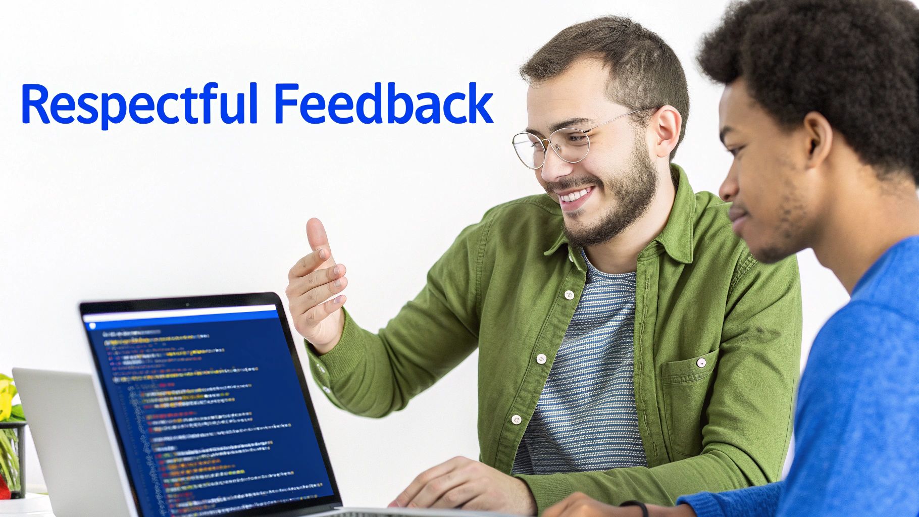 Two young men collaboratively reviewing code on a laptop, exchanging respectful feedback.